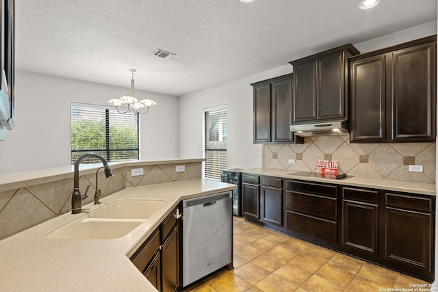 9815 Leubeck Rnch, Helotes, TX 78023 - kitchen featuring dishwasher, a sink, under cabinet range hood, light countertops, and a textured ceiling