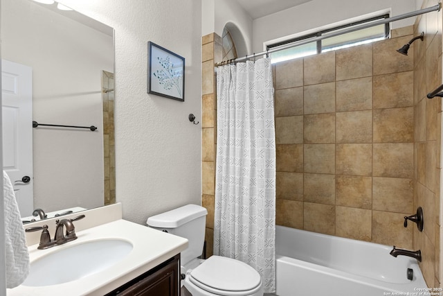 9815 Leubeck Rnch, Helotes, TX 78023 - full bath with toilet, shower / bath combination with curtain, vanity, and a textured wall
