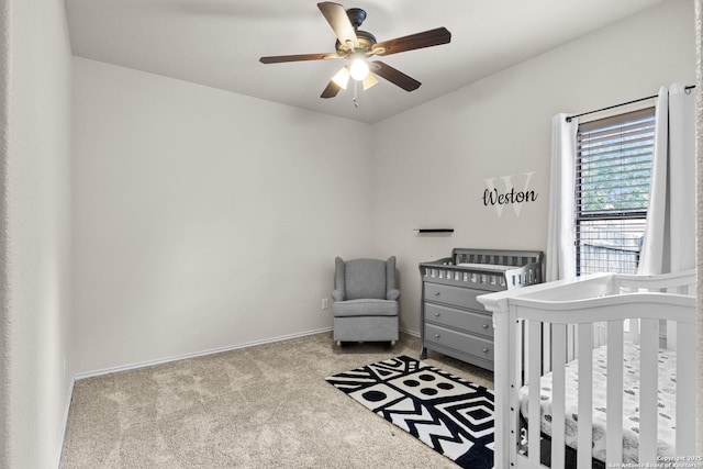 9815 Leubeck Rnch, Helotes, TX 78023 - carpeted bedroom with baseboards and ceiling fan