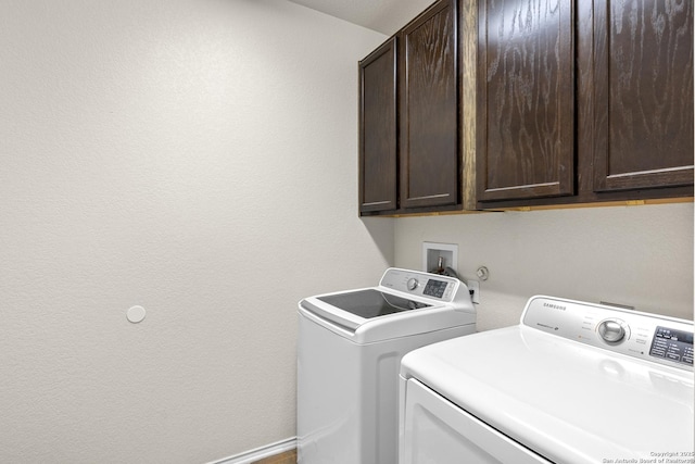 9815 Leubeck Rnch, Helotes, TX 78023 - laundry area with cabinet space and independent washer and dryer