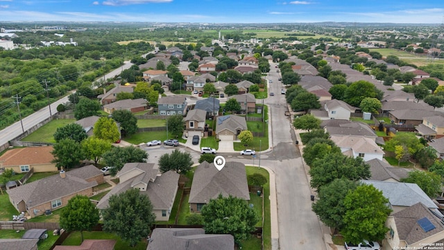 9815 Leubeck Rnch, Helotes, TX 78023 - aerial view of property and surrounding area with nearby suburban area