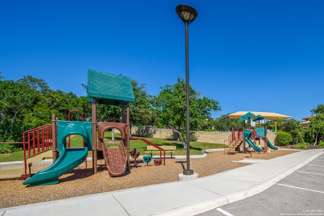 1345 Meester Dr, San Antonio, TX 78245 - community jungle gym with a yard