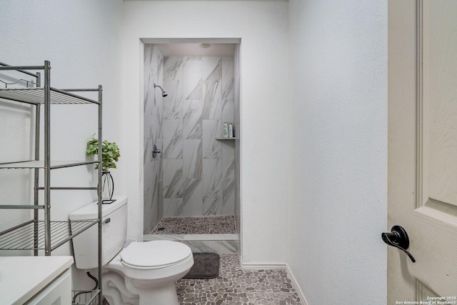 222 Laurelwood, San Antonio, TX 78213 - full bathroom with a stall shower, toilet, vanity, and baseboards