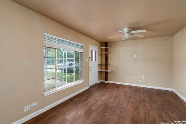 222 Laurelwood, San Antonio, TX 78213 - unfurnished room with dark wood finished floors, baseboards, and ceiling fan