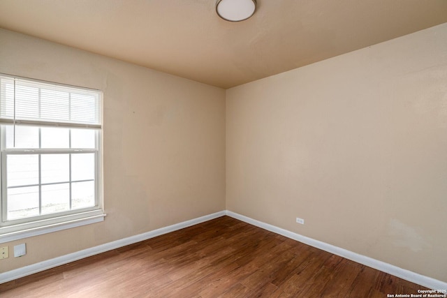 222 Laurelwood, San Antonio, TX 78213 - spare room with wood finished floors, baseboards, and plenty of natural light