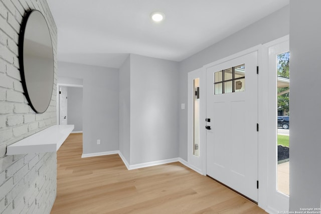 9807 Boulder Hill, San Antonio, TX 78250 - entryway featuring light wood-type flooring and baseboards