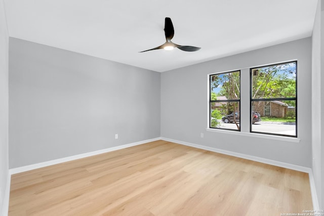9807 Boulder Hill, San Antonio, TX 78250 - spare room with light wood-type flooring, ceiling fan, and baseboards