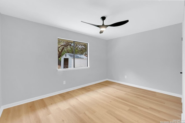 9807 Boulder Hill, San Antonio, TX 78250 - unfurnished room with a ceiling fan, light wood-style flooring, and baseboards
