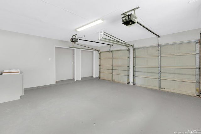 9807 Boulder Hill, San Antonio, TX 78250 - garage with a garage door opener
