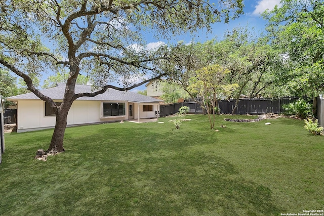 9807 Boulder Hill, San Antonio, TX 78250 - view of yard with a patio