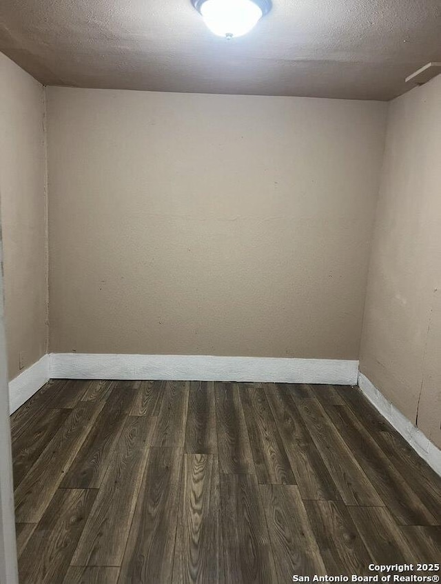 330 E Hart, San Antonio, TX 78214 - unfurnished room featuring baseboards and wood finished floors