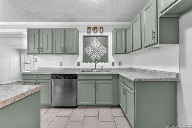 239 Banbridge, San Antonio, TX 78223 - kitchen featuring stainless steel dishwasher, green cabinets, a sink, a textured ceiling, and light countertops
