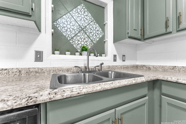 239 Banbridge, San Antonio, TX 78223 - kitchen view of green cabinets, a sink, light countertops, and backsplash