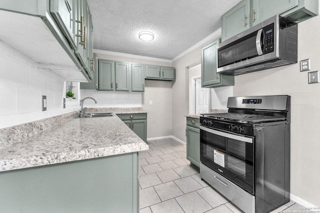 239 Banbridge, San Antonio, TX 78223 - kitchen featuring stainless steel appliances, a sink, light countertops, ornamental molding, and light tile patterned flooring