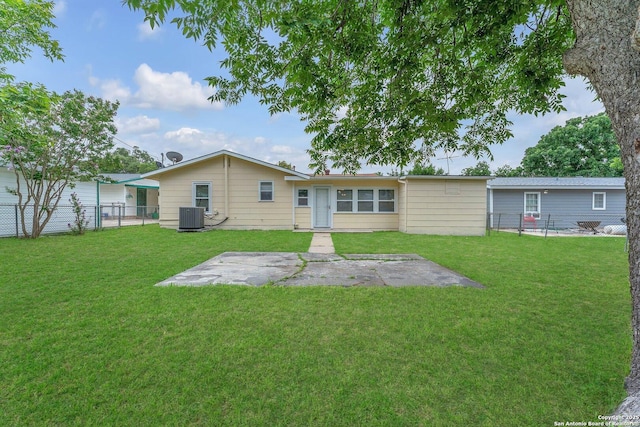 239 Banbridge, San Antonio, TX 78223 - rear view of house with central AC unit and a patio