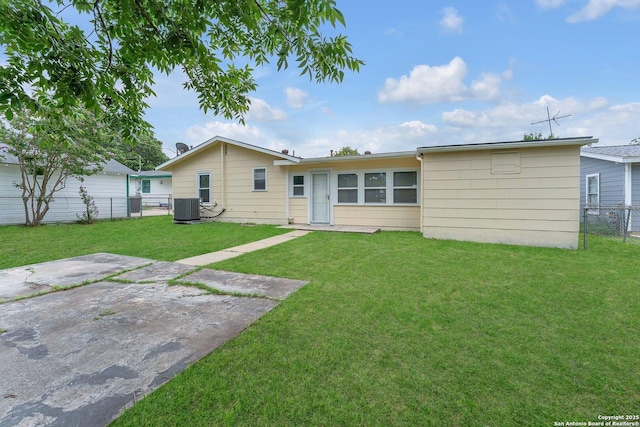 239 Banbridge, San Antonio, TX 78223 - rear view of house with cooling unit and a patio area
