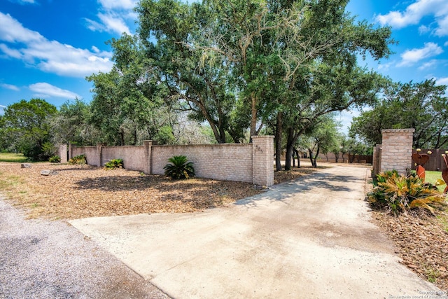 585 Oak Bend Dr, Bandera, TX 78003 - gate featuring a fenced front yard