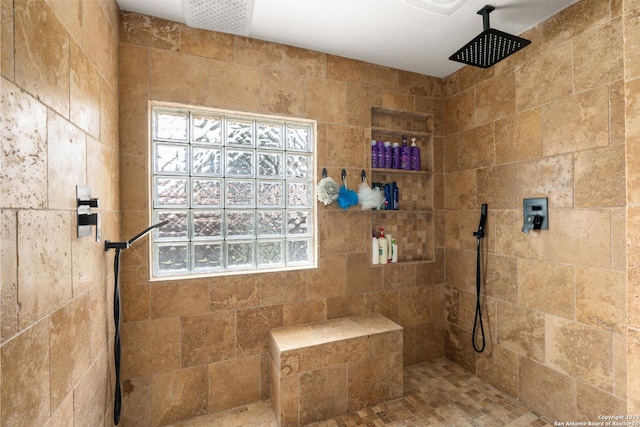 585 Oak Bend Dr, Bandera, TX 78003 - bathroom featuring plenty of natural light and a tile shower