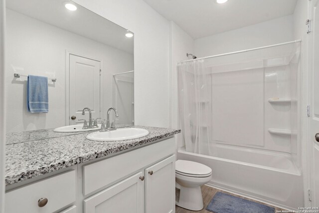 5455 Daphne Path, San Antonio, TX 78253 - bathroom with shower / bath combo, vanity, toilet, recessed lighting, and wood finished floors