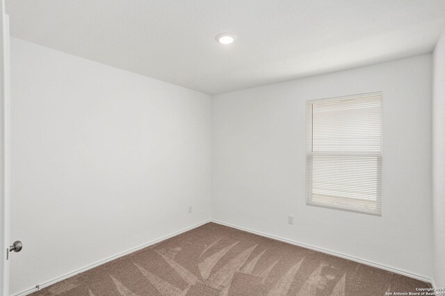 5455 Daphne Path, San Antonio, TX 78253 - carpeted empty room featuring baseboards and recessed lighting