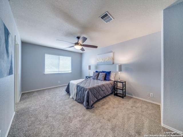 520 Foxford Run Dr, Schertz, TX 78108 - carpeted bedroom featuring baseboards, a textured ceiling, and ceiling fan