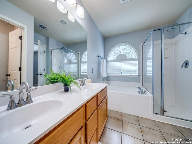 520 Foxford Run Dr, Schertz, TX 78108 - bathroom with a stall shower, a bath, double vanity, and tile patterned flooring