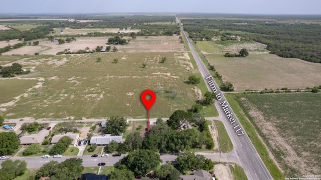 105 S Bluebonnet, Uvalde, TX 78801 - aerial view of property and surrounding area featuring rural landscape