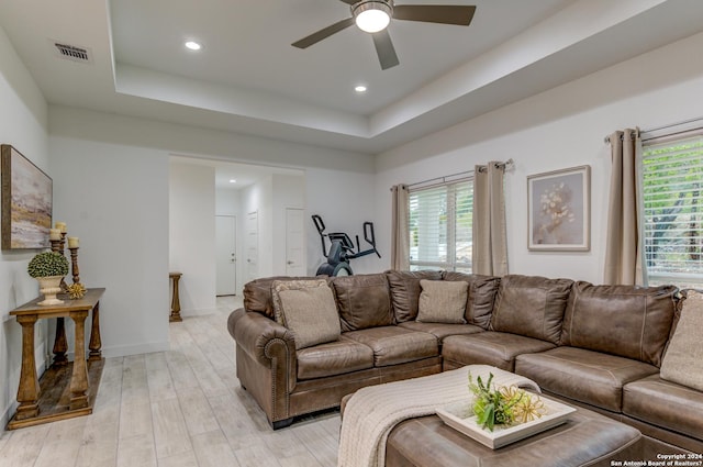 524 Flaman, Canyon Lake, TX 78133 - living area with ceiling fan, light wood-style floors, a tray ceiling, baseboards, and recessed lighting
