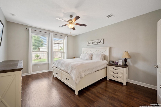 1989 Kalli Jo, New Braunfels, TX 78130 - bedroom with baseboards, dark wood-style floors, and a ceiling fan