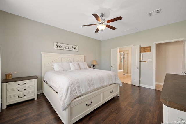 1989 Kalli Jo, New Braunfels, TX 78130 - bedroom with dark wood-style flooring, baseboards, ensuite bath, and a ceiling fan