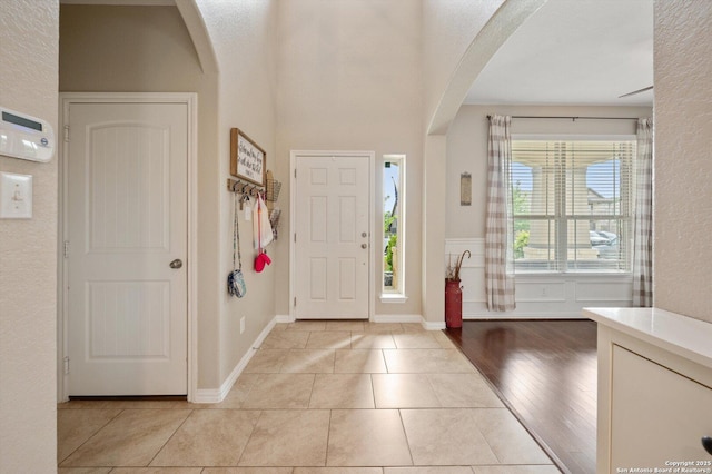 1989 Kalli Jo, New Braunfels, TX 78130 - entryway with arched walkways, light tile patterned floors, and a textured wall