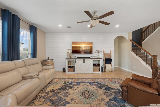 1989 Kalli Jo, New Braunfels, TX 78130 - tiled living room with ceiling fan, stairs, recessed lighting, an accent wall, and baseboards