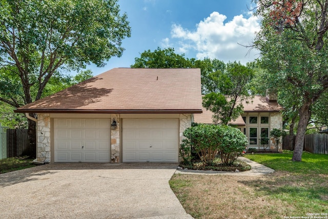 16930 Hidden Timber Wood, San Antonio, TX 78248 - view of front of home featuring stone siding, a garage, and a chimney