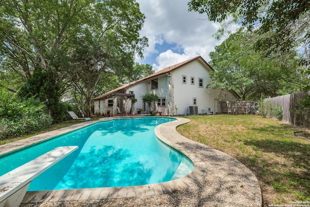 16930 Hidden Timber Wood, San Antonio, TX 78248 - view of swimming pool featuring a diving board and central AC unit