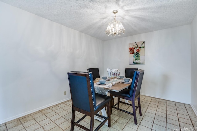16930 Hidden Timber Wood, San Antonio, TX 78248 - dining space featuring a chandelier, light tile patterned floors, a textured ceiling, and baseboards