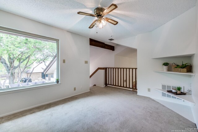 16930 Hidden Timber Wood, San Antonio, TX 78248 - unfurnished living room featuring carpet floors, ceiling fan, and a textured ceiling