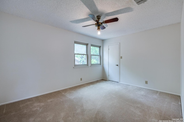 16930 Hidden Timber Wood, San Antonio, TX 78248 - empty room with carpet, a ceiling fan, a textured ceiling, and baseboards