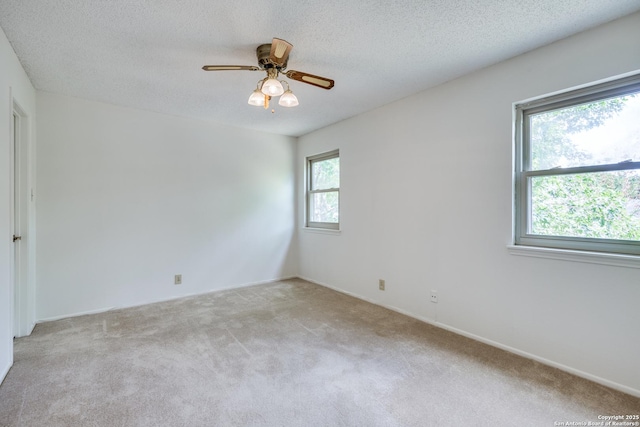 16930 Hidden Timber Wood, San Antonio, TX 78248 - unfurnished room featuring light carpet, ceiling fan, and a textured ceiling