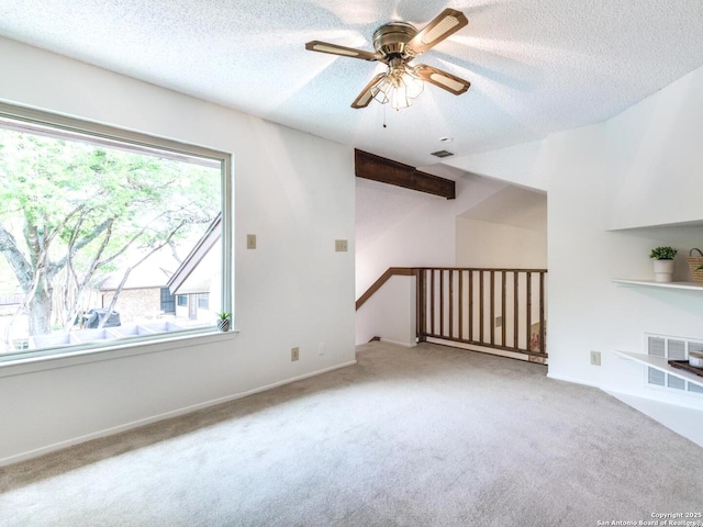 16930 Hidden Timber Wood, San Antonio, TX 78248 - unfurnished living room with carpet, a ceiling fan, and a textured ceiling