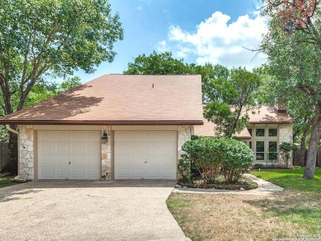 16930 Hidden Timber Wood, San Antonio, TX 78248 - view of front of house with stone siding, a garage, a shingled roof, and a front lawn