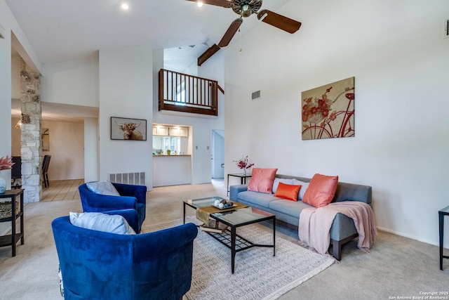 16930 Hidden Timber Wood, San Antonio, TX 78248 - living room featuring carpet floors, ceiling fan, high vaulted ceiling, ornate columns, and baseboards