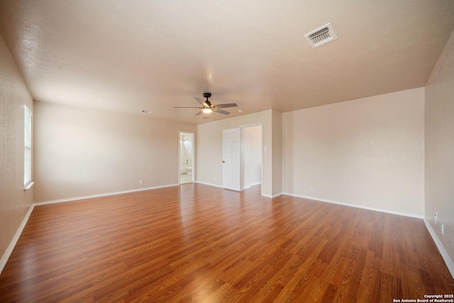 7731 Cedar Farm, San Antonio, TX 78239 - spare room with wood finished floors, baseboards, and a ceiling fan