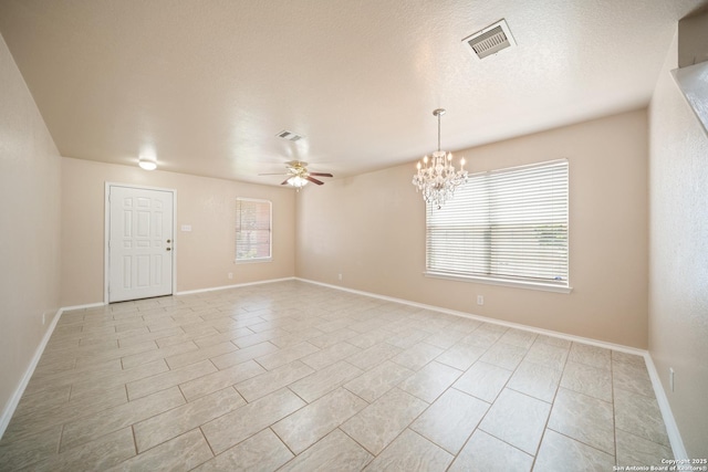 7731 Cedar Farm, San Antonio, TX 78239 - unfurnished room with a ceiling fan, a chandelier, light tile patterned floors, and baseboards