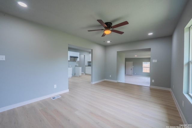 234 Gaiety Ln, Kirby, TX 78219 - unfurnished room featuring a ceiling fan, light wood-style flooring, recessed lighting, and baseboards