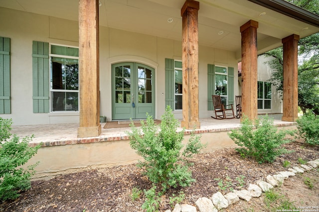 117 Sabella, Spring Branch, TX 78070 - doorway to property with covered porch and french doors