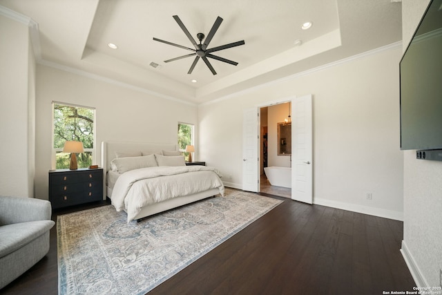 117 Sabella, Spring Branch, TX 78070 - bedroom with a tray ceiling, multiple windows, dark wood-style floors, recessed lighting, and ornamental molding