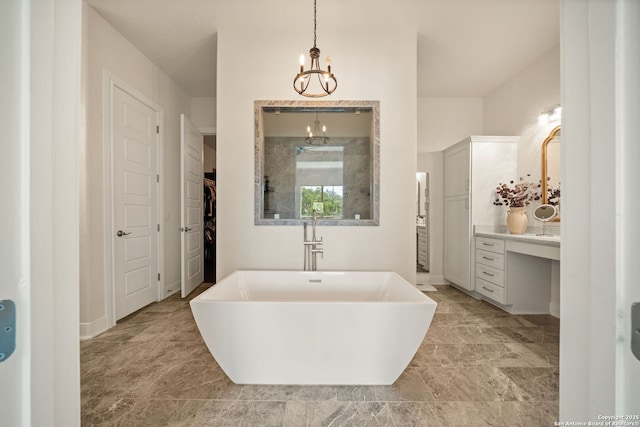 117 Sabella, Spring Branch, TX 78070 - full bathroom with a chandelier, a freestanding tub, a walk in shower, a spacious closet, and vanity