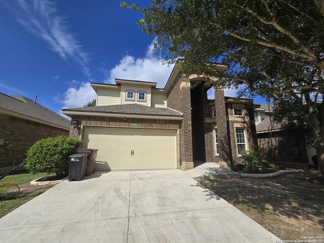 12406 Horse Cres, San Antonio, TX 78254 - traditional home featuring driveway and brick siding