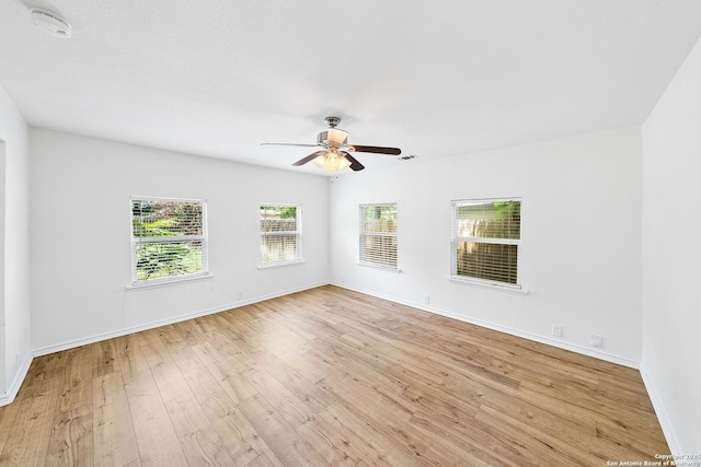 435 Sharon, San Antonio, TX 78216 - unfurnished room featuring wood finished floors, a ceiling fan, baseboards, and a smoke detector