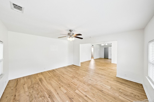 435 Sharon, San Antonio, TX 78216 - unfurnished room with ceiling fan, light wood-style flooring, and baseboards